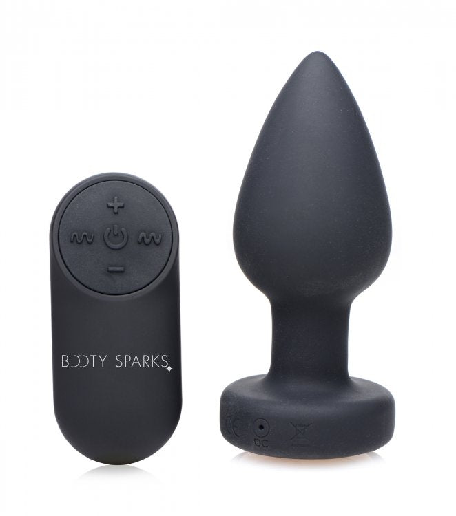 Plug de silicona con vibración LED mediano de Booty Sparks