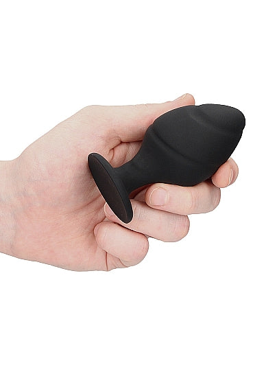 Juego de tapones con sensación de remolino de obsidiana