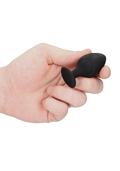 Juego de tapones con sensación de remolino de obsidiana