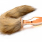 Tapón de cola de zorro de vidrio naranja juguetón