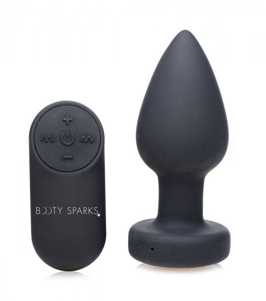 Plug de silicona con vibración LED mediano de Booty Sparks